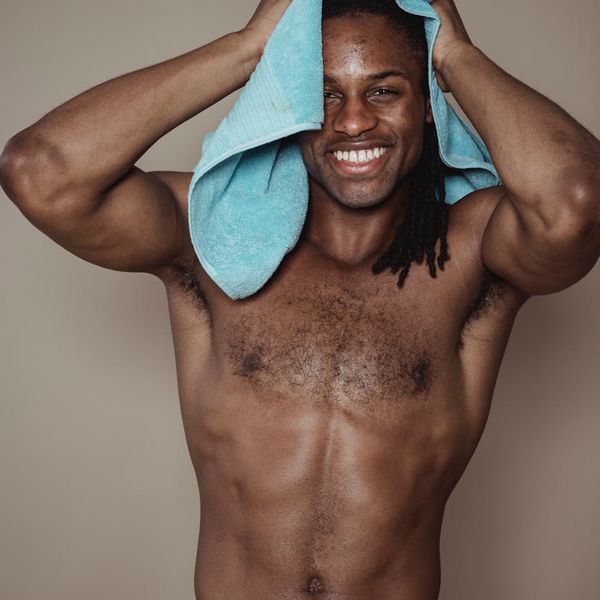 A man looking energized and positive after a workout session.